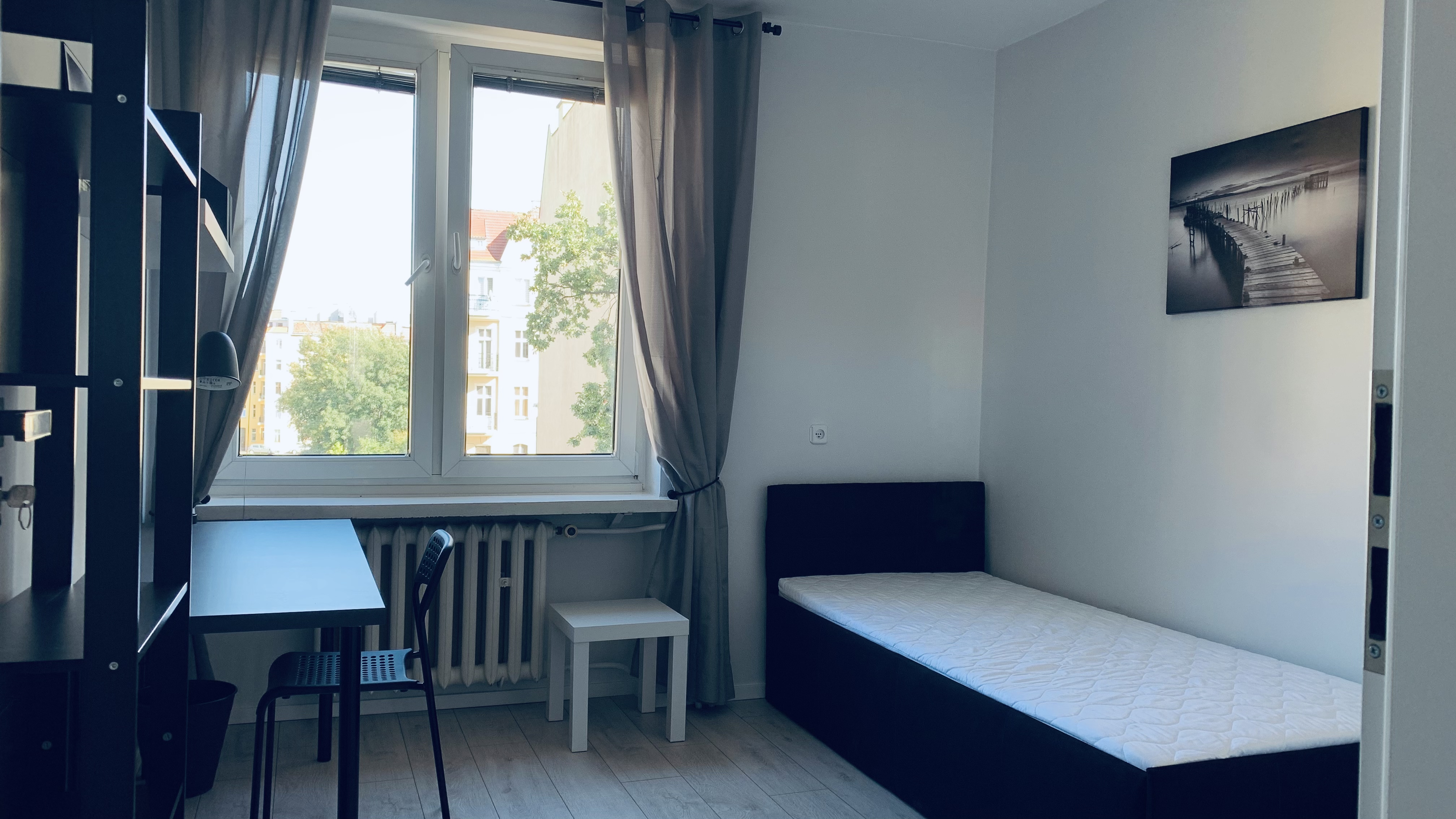 Private Student Room #3 at Borowska with bed, window and desk
